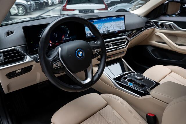 BMW i4 eDrive40 84 kWh Gran Coupe Navi Leer Elektr. achterklep Climate voor & achter Beige hemelbekleding PDC LM velgen BTW auto
