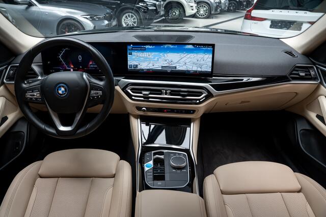 BMW i4 eDrive40 84 kWh Gran Coupe Navi Leer Elektr. achterklep Climate voor & achter Beige hemelbekleding PDC LM velgen BTW auto