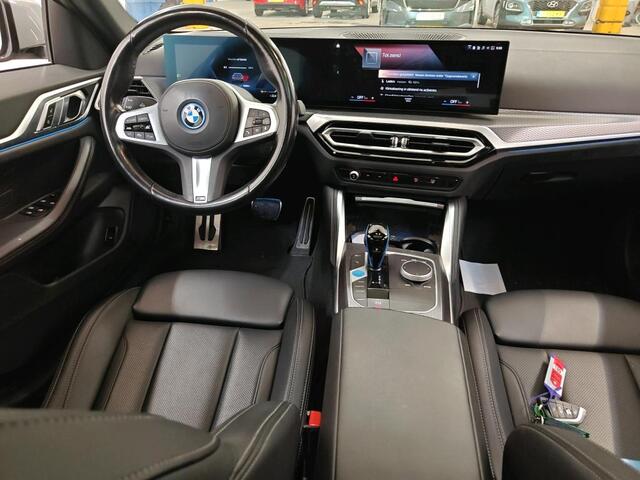 BMW i4 eDrive40 84 kWh Schuik-kanteldak Leer Camera Led