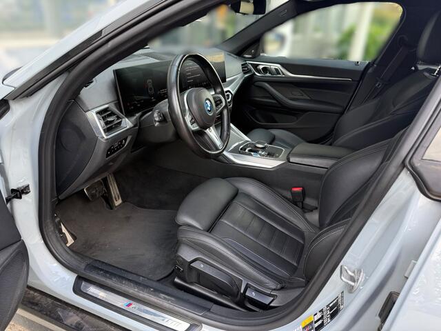 BMW i4 eDrive40 High Executive 84 kWh M Sport | Panoramadak | Stoelverwarming | Stuurverwarming | Harman Kardon | Adaptive Cruise Control | Laser LED | 360 Camera | Keyless | Navigatie | Head-Up Display | Ambiance Verlichting |