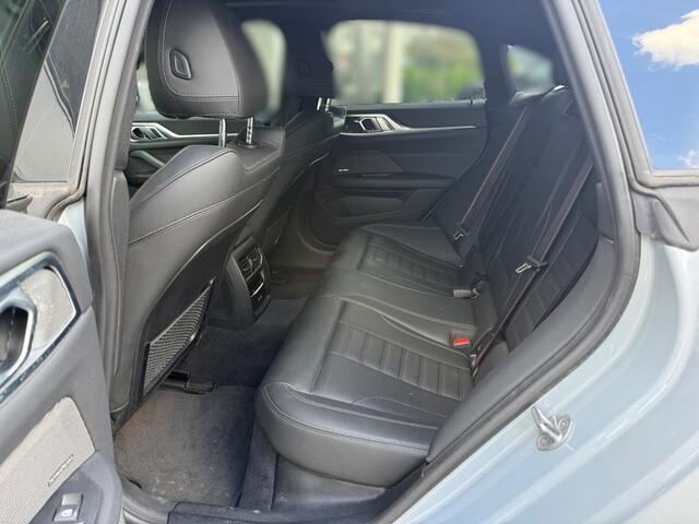 BMW i4 eDrive40 High Executive 84 kWh M Sport | Panoramadak | Stoelverwarming | Stuurverwarming | Harman Kardon | Adaptive Cruise Control | Laser LED | 360 Camera | Keyless | Navigatie | Head-Up Display | Ambiance Verlichting |
