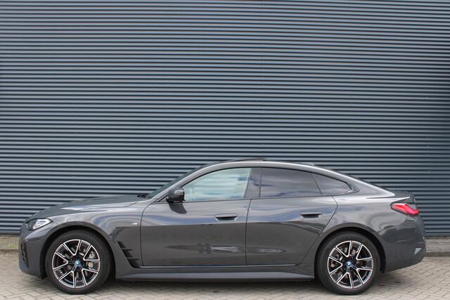 BMW i4 eDrive40 84 kWh M-Sport Dravitgrau Schuif-/kanteldak Leer Harman-Kardon Camera