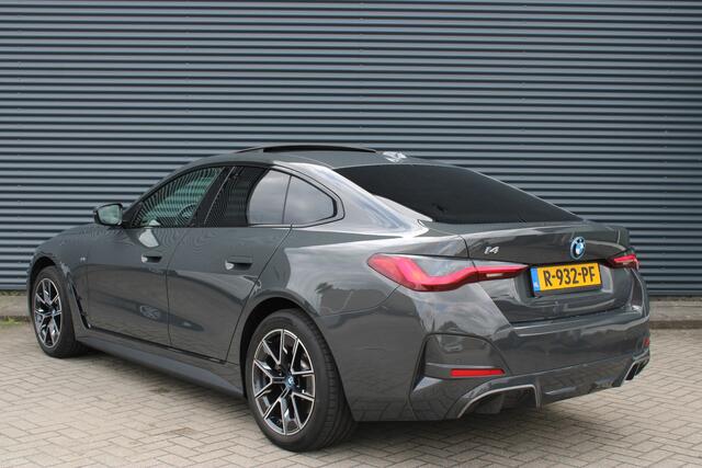 BMW i4 eDrive40 84 kWh M-Sport Dravitgrau Schuif-/kanteldak Leer Harman-Kardon Camera