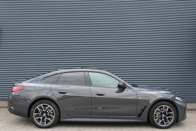 BMW i4 eDrive40 84 kWh M-Sport Dravitgrau Schuif-/kanteldak Leer Harman-Kardon Camera