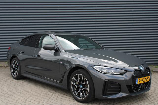 BMW i4 eDrive40 84 kWh M-Sport Dravitgrau Schuif-/kanteldak Leer Harman-Kardon Camera