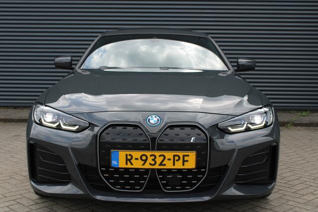 BMW i4 eDrive40 84 kWh M-Sport Dravitgrau Schuif-/kanteldak Leer Harman-Kardon Camera