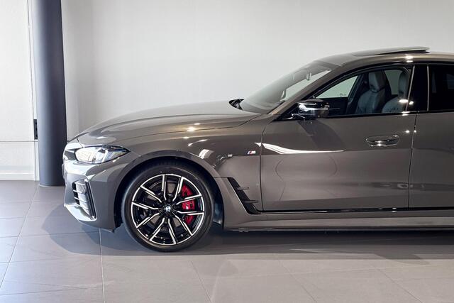 BMW i4 M60 84 kWh | M Sport Pro | Glazen Schuif-/kanteldak | M Sportstoelen | Harman Kardon | Comfort Access |