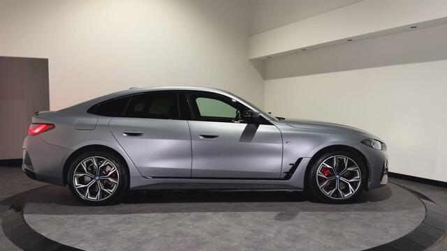 BMW i4 M50 84 kWh M Sport Pro | SOH 97,6% | el. Schuif/kanteldak | el. stoelen met memory | HUD | Unieke kleur