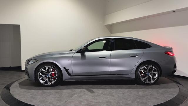 BMW i4 M50 84 kWh M Sport Pro | SOH 97,6% | el. Schuif/kanteldak | el. stoelen met memory | HUD | Unieke kleur