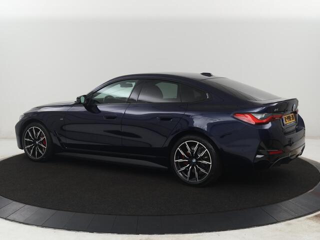 BMW i4 M50 High Executive 84 kWh | SOH 94,4% | Leder | Adaptive cruise | xDrive | Stoelverwarming | Head-up | Harman/Kardon | Carplay | Sfeerverlichting | 360 camera | Park assist | Elektrische achterklep