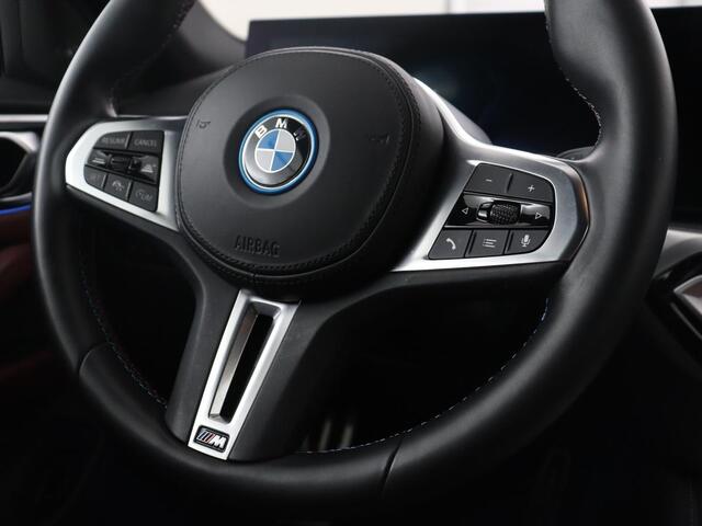 BMW i4 M50 High Executive 84 kWh | SOH 94,4% | Leder | Adaptive cruise | xDrive | Stoelverwarming | Head-up | Harman/Kardon | Carplay | Sfeerverlichting | 360 camera | Park assist | Elektrische achterklep