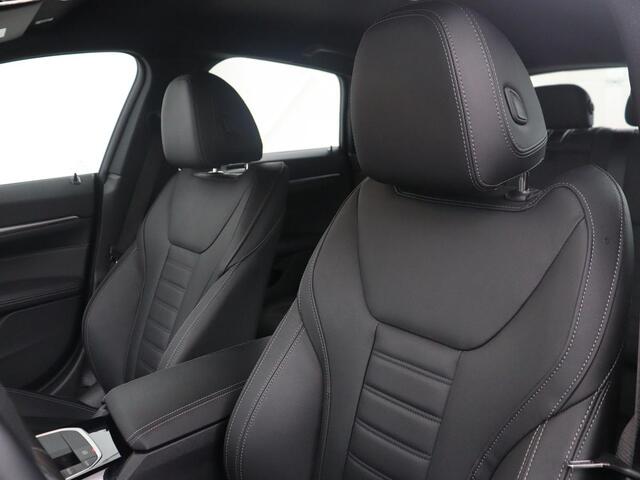 BMW i4 eDrive40 High Executive 84 kWh | SOH 98,7% | Leder | Adaptive cruise | Dodehoek detectie | Head-up | Stoelverwarming | Sfeerverlichting | Carplay | 3 zone klimaat | Camera | Park assist | Elektrische achterklep