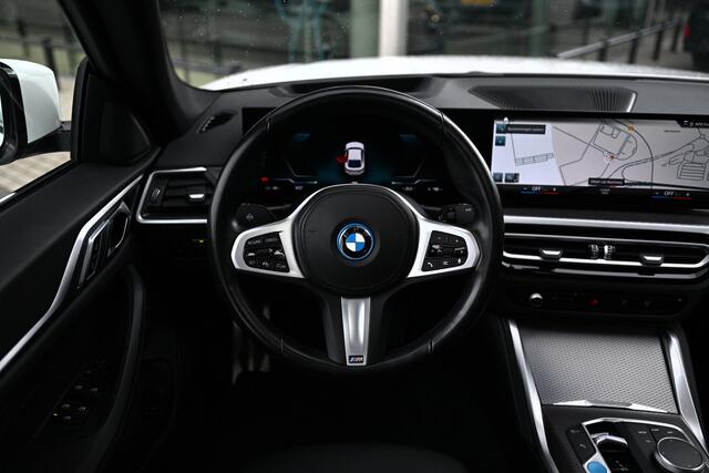 BMW i4 eDrive40 High Executive M Sport / Achteruitrijcamera / Comfort Access / Active Cruise Control / Live Cockpit Professional / Stoelverwarming
