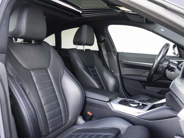 BMW i4 eDrive40 | High Executive | M Sport | Schuif-/kanteldak | Driving Assistant Professional | Stuurwielrand verwarmd | Head Up Display