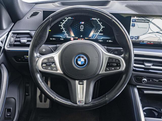 BMW i4 eDrive40 | High Executive | M Sport | Schuif-/kanteldak | Driving Assistant Professional | Stuurwielrand verwarmd | Head Up Display