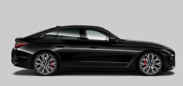 BMW i4 M50 High Executive 84 kWh Panoramadak - Driving Assistant Professional - Harman Kardon - Stuurwielrand verwarmd - Elektrisch verwarmde/verstelbare stoelen - Parking Assistant Plus - Getinte Ruiten -