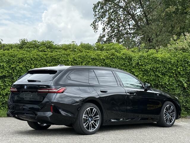 BMW i5 Touring eDrive40 | M-Sport | 19'' | Driv. Ass. Plus | Driv. Ass. | Adapt. LED | Camera | Getint glas | Stoelverw.
