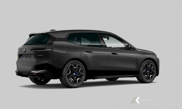 BMW iX xDrive40 Sportpakket | Multifunctionele Stoelen | Stoelventilatie | Harman/Kardon | Driving Ass. Prof. | 360 Camera | Suite Amido | Trekhaak |
