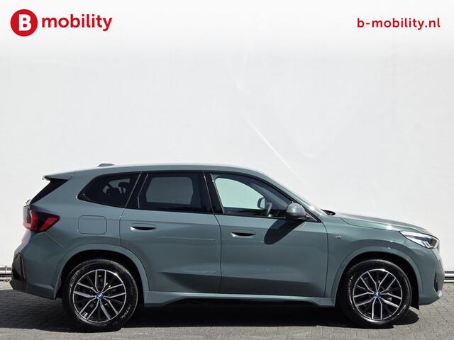 BMW iX1 eDrive20 67 kWh M-Sport SOH 99% Driving Assist. Plus | Sportstoelen | Park Assist | Leer | Adaptive Cruise Control | DAB | NL Auto! | Achteruitrijcamera