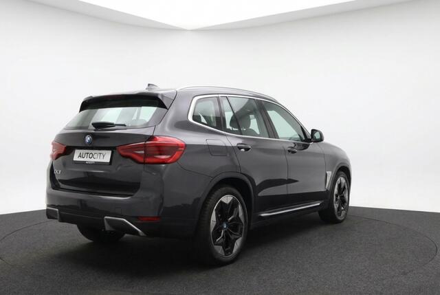BMW iX3 High Executive 80 kWh Pano | Trekhaak | Harman Kardon | HUD | 360° Camera