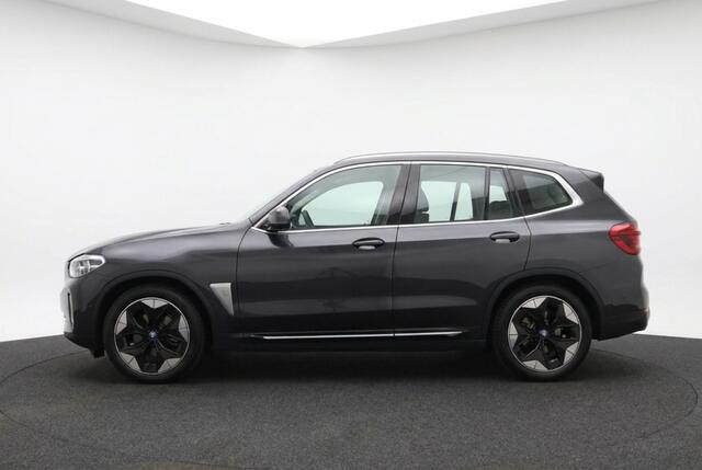 BMW iX3 High Executive 80 kWh Pano | Trekhaak | Harman Kardon | HUD | 360° Camera