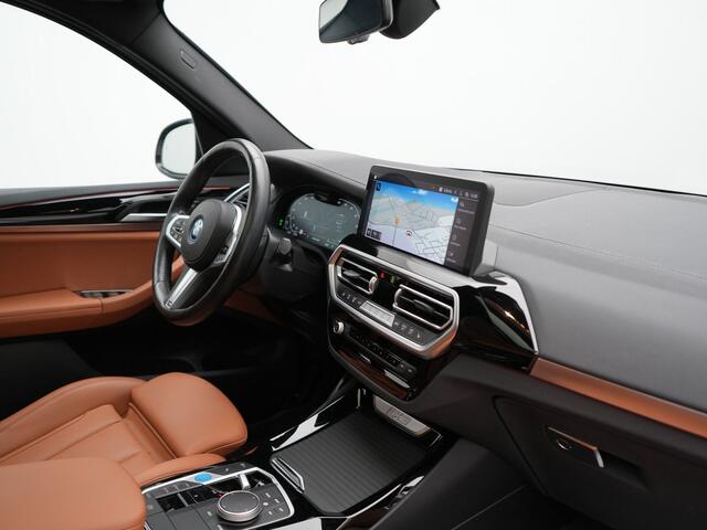 BMW iX3 M Sport 80 kWh 286pk Dealer O.H | Panodak | Adaptive Cruise | Camera | Lederen Sportstoelen Memory & Verwarmd | Sfeerverlichting | Blis | Apple Carplay | Navigatie | DAB | 19"L.M
