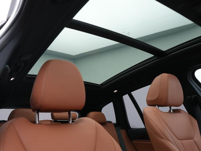 BMW iX3 M Sport 80 kWh 286pk Dealer O.H | Panodak | Adaptive Cruise | Camera | Lederen Sportstoelen Memory & Verwarmd | Sfeerverlichting | Blis | Apple Carplay | Navigatie | DAB | 19"L.M