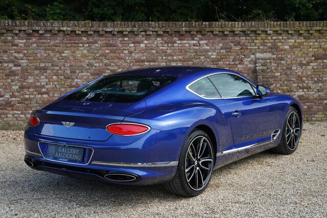 Bentley CONTINENTAL New GT 6.0 W12 "2.800 km" Presented in Moroccan Blue with coloursplit blue leather interior and Burr Walnut veneer, 2.800 kilometers and one owner from new, Newly delivered in Luxembourg, Full Bentley service history,