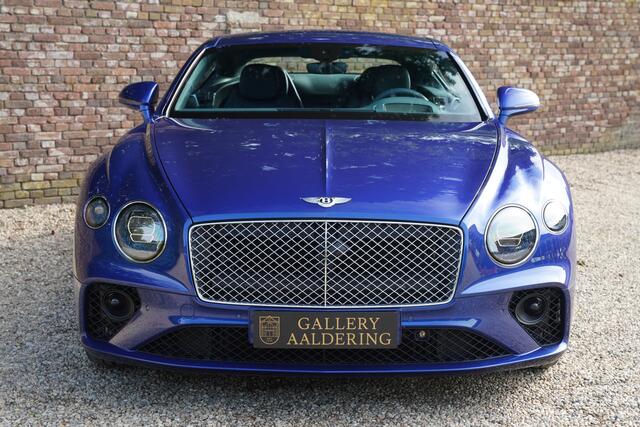 Bentley CONTINENTAL New GT 6.0 W12 "2.800 km" Presented in Moroccan Blue with coloursplit blue leather interior and Burr Walnut veneer, 2.800 kilometers and one owner from new, Newly delivered in Luxembourg, Full Bentley service history,