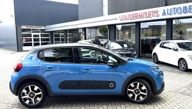 Citroen C3 1.2 Benzine 82 Pk Shine * Superluxe * Navigatie * Dab Radio * Climate & Cruise Control * Achteruitrij Parkeer Camera & Sensoren * Blauw met Zwart Dak * Vingerhoets; Vierde Generatie Eersteklas Service. Al meer dan 100 jaar een begrip in de Brabantse Kempe
