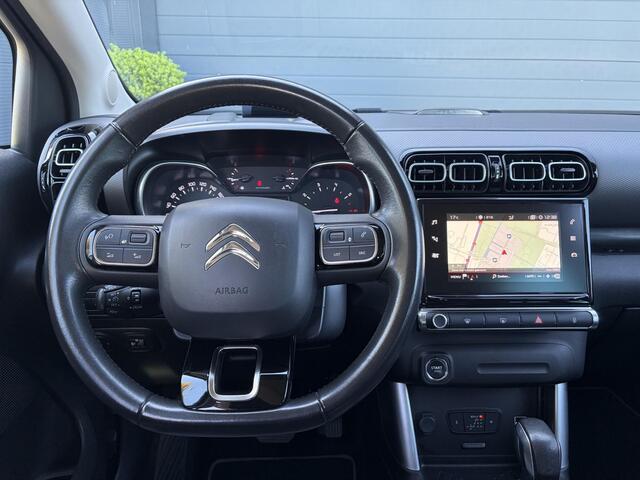 Citroen C3 Aircross 1.2 PureTech S&S Shine ?D-riem vv in 2025?Dealer Onderhouden?Camera?Trekhaak?Keyless?2e Eigenaar?Draadloze telefoonlader?Head-up Display?Carplay?Navi?Clima?Cruise?Pdc V+A?Rijstrooksensor?Dodehoeksensor?110pk?17'' Lm velgen?N.A.P?Apk tot 01-2027