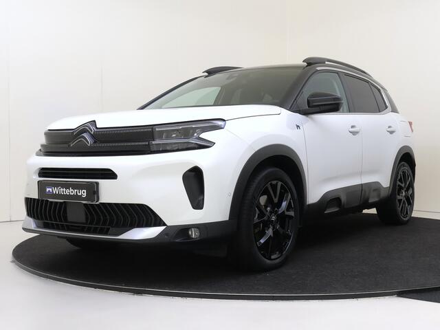 Citroen C5 Aircross 1.6 Plug-in Hybrid 225 Shine I AUTOMAAT I NAVIGATIE I ACHTERUITRIJCAMERA I PARKEERSENSOREN VOOR EN ACHTER I ZWART DAK + ZWARTE L.M. VELGEN I LUXE ZWART INTERIEUR I ZIET ERUIT ALS NIEUW I