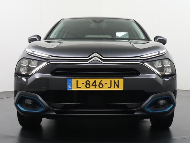 Citroen ë-C4 EV Shine 50 kWh 136 pk Automaat | Navigatie | Achteruitrijcamera | Verwarmde Comfortstoelen | Lederen Bekleding | Keyless Entry/Start | Full-LED Koplampen | Adaptief Demping Systeem | Dodehoek Detectie | Adaptieve Cruise Control | 18" Lichtmetalen Velgen 