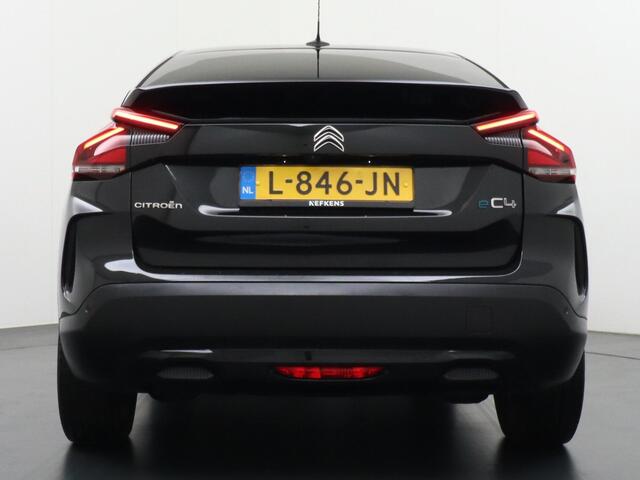 Citroen ë-C4 EV Shine 50 kWh 136 pk Automaat | Navigatie | Achteruitrijcamera | Verwarmde Comfortstoelen | Lederen Bekleding | Keyless Entry/Start | Full-LED Koplampen | Adaptief Demping Systeem | Dodehoek Detectie | Adaptieve Cruise Control | 18" Lichtmetalen Velgen 
