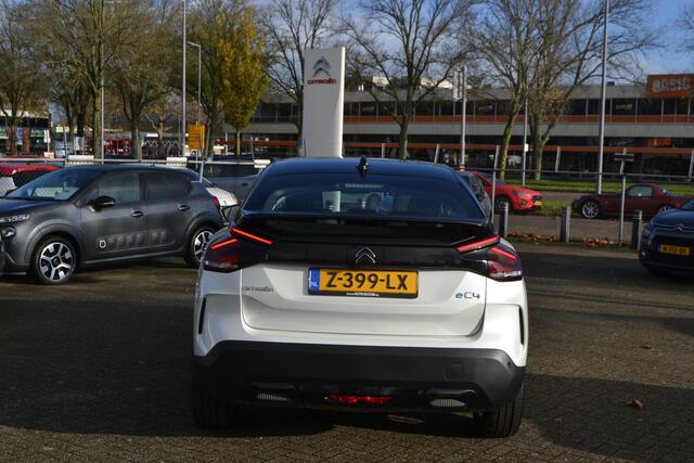 Citroen ë-C4 50 KW I FEEL I NAVIGATIE I ACHTERUITRIJCAMERA I L.M. VELGEN I MICA / PARELMOER KLEUR WIT + ZWART DAK I PARKEERSENSOREN ACHTER I POMPSET I IN STAAT VAN NIEUW I LAGE KM.STAND 128 Km I