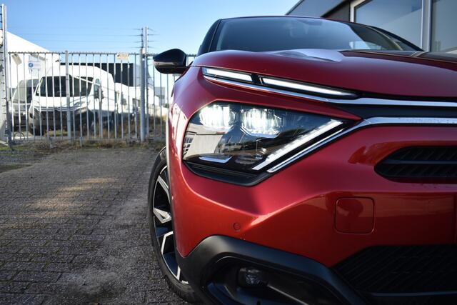 Citroen ë-C4 Shine 50 kWh | SOH 91% | Navigatie | Airconditioning ECC | Apple Carplay & Android Auto | Camera | Drive assist | Stoelverwarming | Keyless | Leder / stof | Head Up Display | Dodehoek Detectie | Parkeersensoren voor en achter | Lichtmetaal | Zeer Compleet