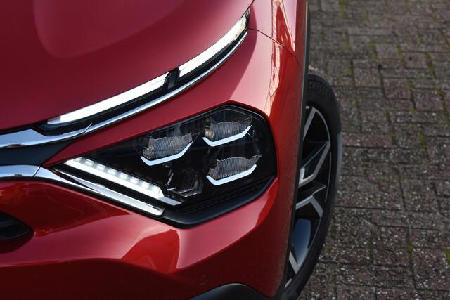 Citroen ë-C4 Shine 50 kWh | SOH 91% | Navigatie | Airconditioning ECC | Apple Carplay & Android Auto | Camera | Drive assist | Stoelverwarming | Keyless | Leder / stof | Head Up Display | Dodehoek Detectie | Parkeersensoren voor en achter | Lichtmetaal | Zeer Compleet
