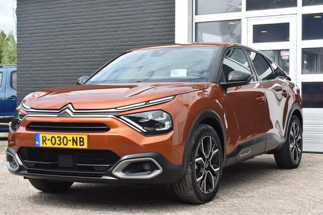 Citroen ë-C4 Shine 50 kWh | Navigatie | Apple Carplay & Android Auto | Camera | Parkeersensoren voor en achter | Dodehoekdetectie | Head Up Display | Stoelverwarming | Lichtmetaal | Zeer Compleet!