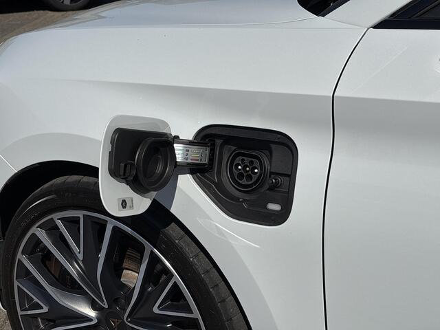 Cupra Leon Sportstourer 1.4 e-Hybrid VZ Performance | Plug-in Hybrid (PHEV) | Achteruitrijcamera | Parkeersensoren | Beats Audio | Cruise Control Adaptief | Keyless Entry | Elektrische Achterklep | Stoelverwarming | Navigatie | Apple Carplay | Android Auto | Lichtmetalen Velgen 19 inch | Alarm