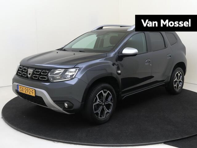 Dacia DUSTER 1.2 TCe Prestige | All-Seasonbanden | Camera | Blind Spot Warning | PDC Achter | Cruise Control & Snelheidsbegrenzer | Automatische Verlichting | 17" LMV | Privacy Glass | Apple Carplay & Android Auto