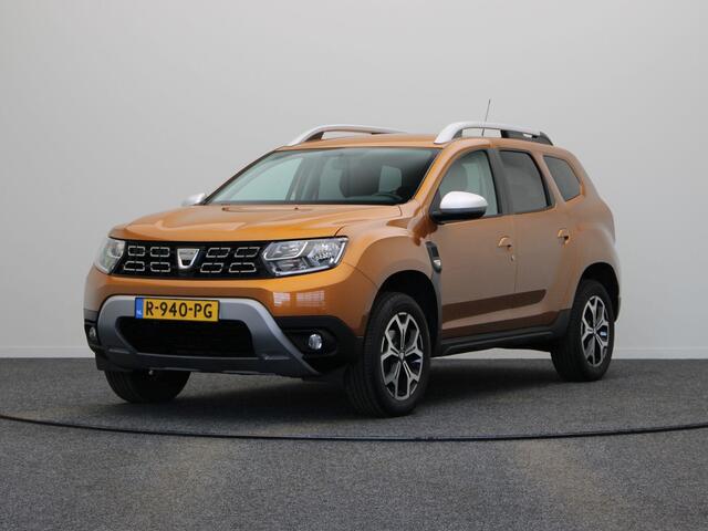 Dacia DUSTER TCe 100pk Bi-Fuel Comfort | Dealer onderhouden | Stoelverwarming | 360 graden camera | Trekhaak | Climate Control | Dodehoek detectie |