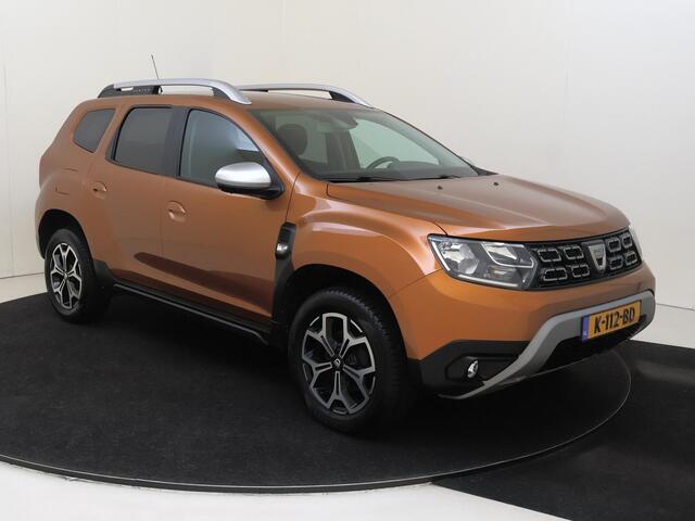 Dacia DUSTER 1.2 TCe Prestige | airco | cruise control | dodehoek detectie | lichtmetalen velgen 17" | navigatiesysteem full map |