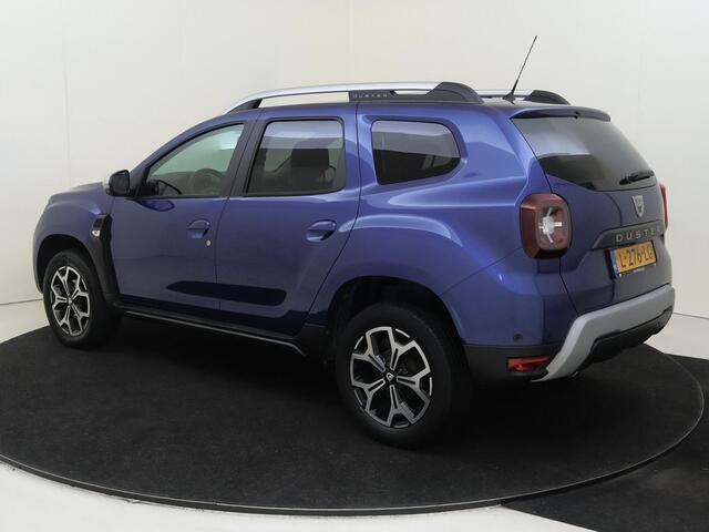 Dacia DUSTER 1.3 TCe Prestige | airco | Apple Carplay/Android Auto | cruise control | dodehoek detectie | lichtmetalen velgen 17" | navigatiesysteem full map | airco automatisch |