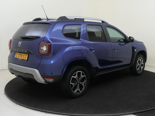 Dacia DUSTER 1.3 TCe Prestige | airco | Apple Carplay/Android Auto | cruise control | dodehoek detectie | lichtmetalen velgen 17" | navigatiesysteem full map | airco automatisch |