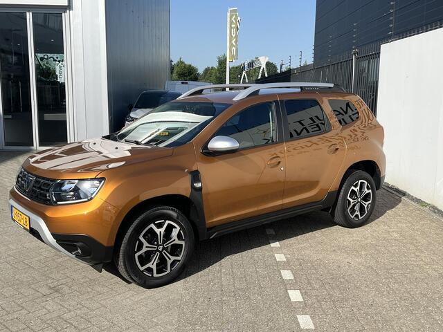 Dacia DUSTER 1.3 TCe Prestige l CAMERA 360 l PARKEERSENSOREN l NAVIGATIE l CLIMATE CONTROL