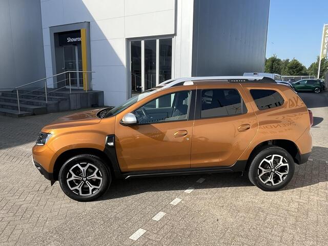 Dacia DUSTER 1.3 TCe Prestige l CAMERA 360 l PARKEERSENSOREN l NAVIGATIE l CLIMATE CONTROL