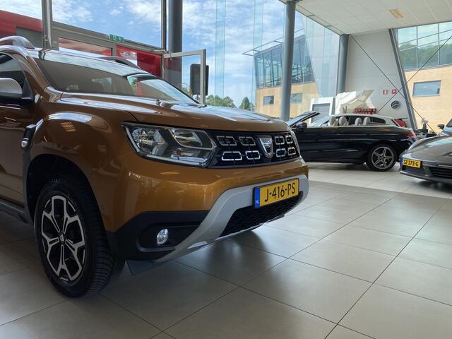 Dacia DUSTER 1.0 TCe Prestige,2E Eigenaar,Dealeronderhouden,Navigatie,Achteruitrijcamera,Bluetooth,Spraakbediening,DAB,Airco,Cruisecontrol,Trekhaak,V&A Sensoren,Dakrail,17 Inch Lmv