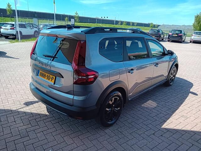 Dacia Jogger 1.6 Hybrid 140 Extreme 7p. Automaat, Airco(automatisch), Carplay/Android auto, Bluetooth, Camera, Parkeersensoren, Dode hoek detector, Cruise control, Stoelverwarming, Dimlicht automatisch, Regensensor, SOS diensten, Keyless, Elektrische ramen en spiegels