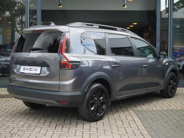 Dacia Jogger 1.8 hybrid 155 extreme 7p. AUTOMAAT / 9.000KM / NIEUWSTE MODEL / CAMERA / PDC V+A / BLINDSPOT / CRUISE / CLIMATE / KEYLESS / APPLE CARPLAY / ANDROID AUTO / DAKRAILS / 16'' LMV