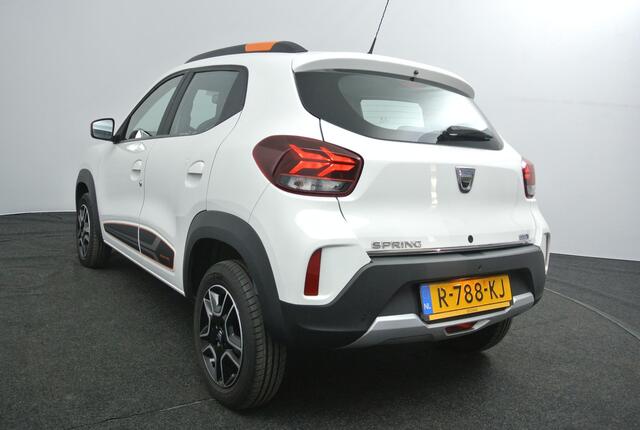 Dacia Spring Comfort Plus 27 kWh | DC Lader | Orange Pack | Navigatie | Camera |